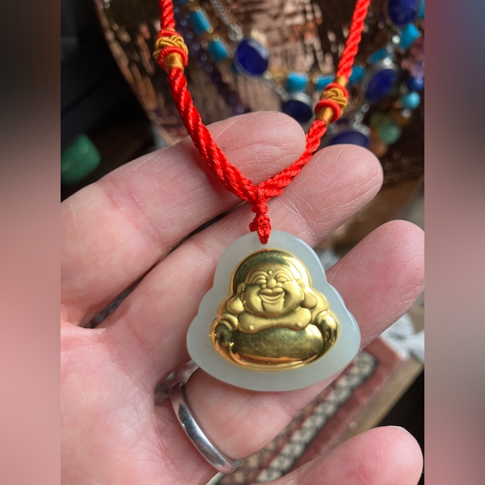 Gold plated Buddha on an adjustable necklace